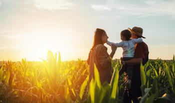 Family of three in field